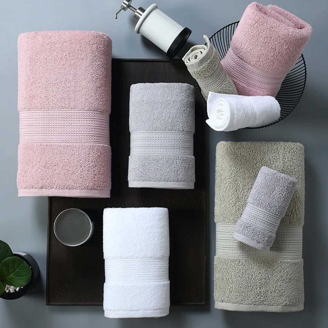 Cotton towels arranged for a calm bathroom